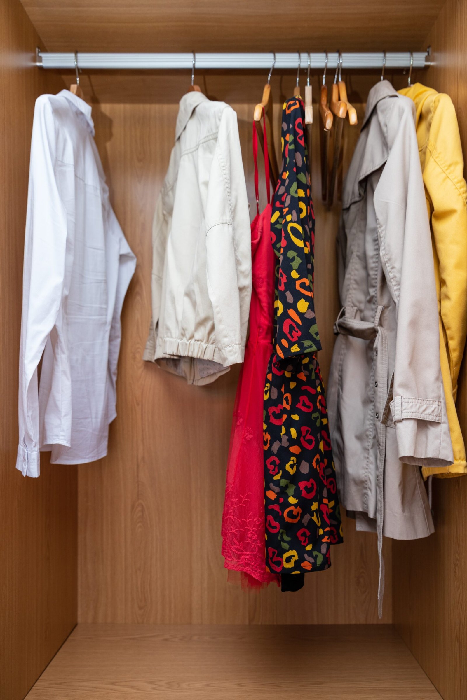Interior,Of,A,Closet,With,Hanging,Clothes